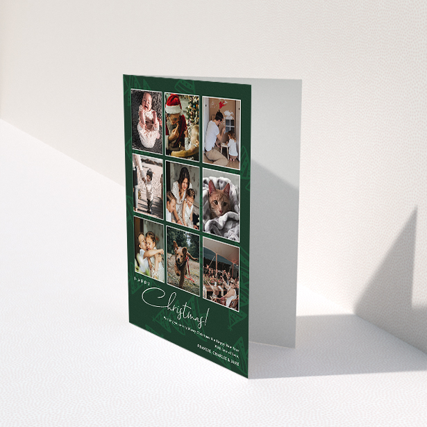 A custom christmas card design called "Forrest Green". It is an A5 card in a portrait orientation. It is a photographic custom christmas card with room for 9 photos "Forrest Green" is available as a folded card, with tones of green and white.
