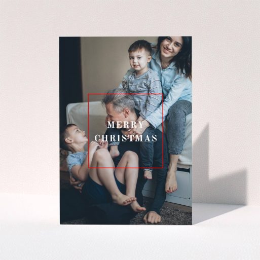 A custom christmas card named "Modern Christmas". It is an A5 card in a portrait orientation. It is a photographic custom christmas card with room for 1 photo. "Modern Christmas" is available as a folded card, with mainly red colouring.