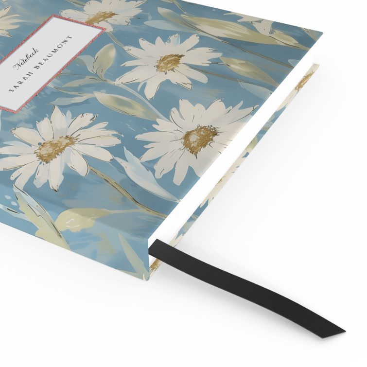 Floral notebook cover design with a blue background featuring white daisies - personalised stationery by Utterly Printable