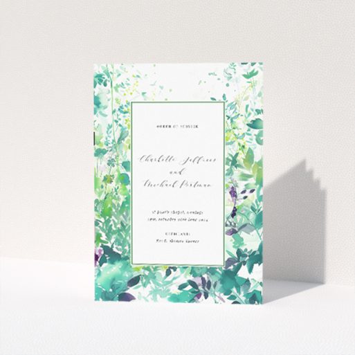 Serene Dappled Wedding Order of Service Booklet with Watercolour Greenery and Purple Blooms. This is a view of the front