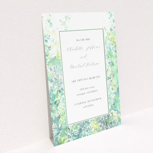 Dappled Wedding Save the Date Card - Watercolour illustration of green foliage framing a white central space. Landscape orientation for balanced presentation This is a view of the back