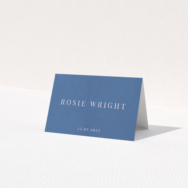 Daylight Script place cards table template - subtle blue background with crisp white text for modern elegance and understated luxury. This is a third view of the front