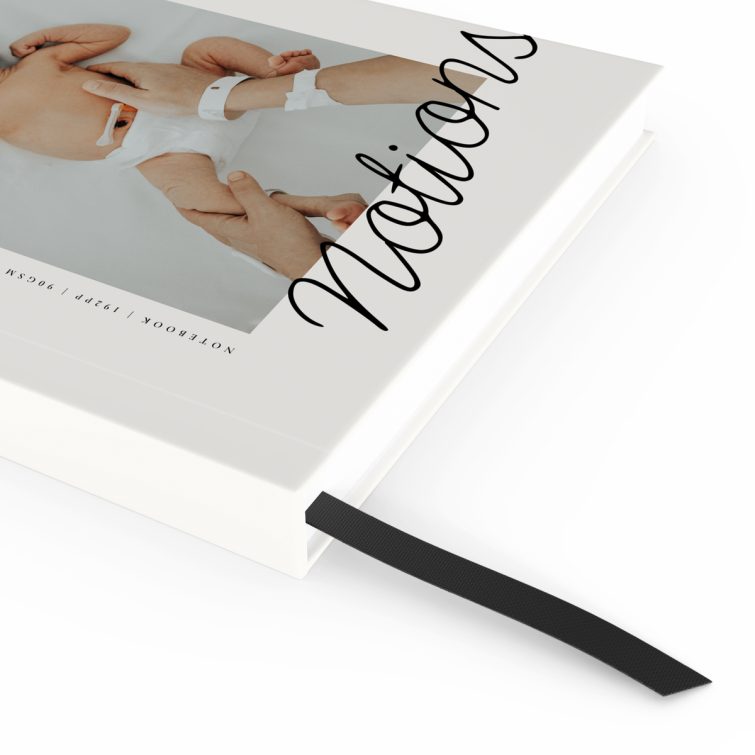 Utterly Printable personalised notebook design with baby photo on front cover, featuring elegant typography and a portrait orientation.