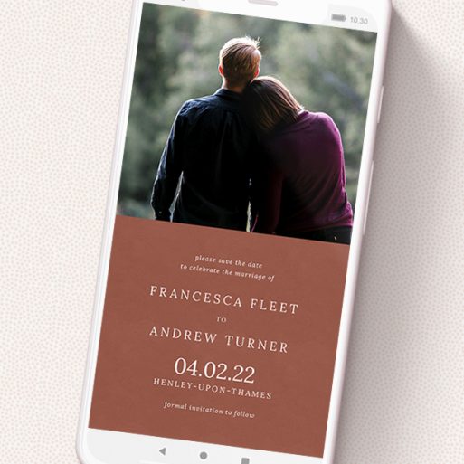 A digital save the date named 'Autumnal Photo'. It is a smartphone screen sized save the date in a portrait orientation. It is a photographic digital save the date with room for 1 photo. 'Autumnal Photo' is available as a flat save the date, with mainly dark orange colouring.