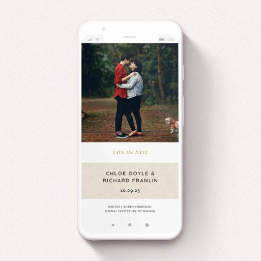 A digital save the date template titled "Banded". It is a smartphone screen sized save the date in a portrait orientation. It is a photographic digital save the date with room for 1 photo. "Banded" is available as a flat save the date, with mainly dark cream colouring.