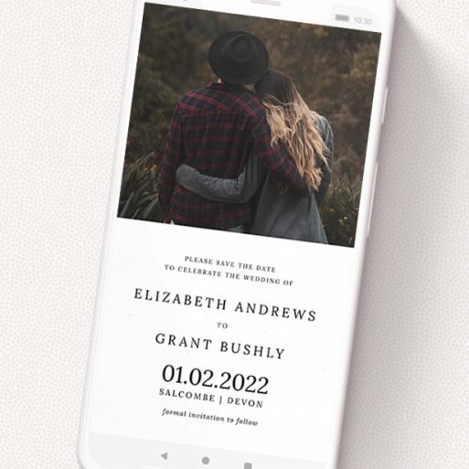 A digital save the date named 'Half and Half'. It is a smartphone screen sized save the date in a portrait orientation. It is a photographic digital save the date with room for 1 photo. 'Half and Half' is available as a flat save the date, with mainly white colouring.