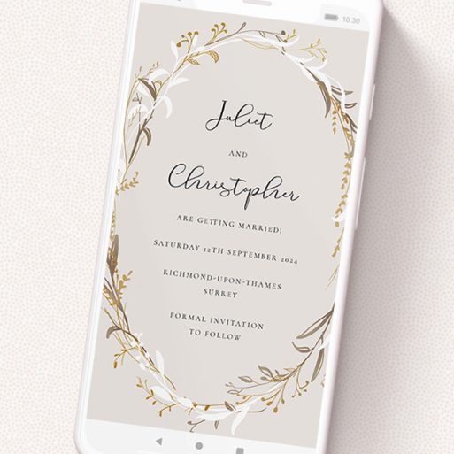 A digital save the date design called 'Metallic Wreath'. It is a smartphone screen sized save the date in a portrait orientation. 'Metallic Wreath' is available as a flat save the date, with tones of cream, gold and white.