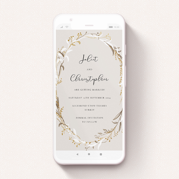 A digital save the date design called "Metallic Wreath". It is a smartphone screen sized save the date in a portrait orientation. "Metallic Wreath" is available as a flat save the date, with tones of cream, gold and white.