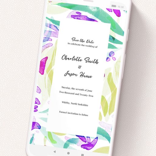 A digital save the date design called 'Neon Florals'. It is a smartphone screen sized save the date in a portrait orientation. 'Neon Florals' is available as a flat save the date, with tones of white, green and yellow.