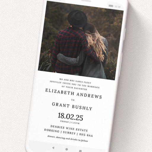 A digital wedding invite design called 'Half and Half'. It is a smartphone screen sized invite in a portrait orientation. It is a photographic digital wedding invite with room for 1 photo. 'Half and Half' is available as a flat invite, with mainly white colouring.