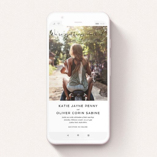 A digital wedding invite named "Hoxton Square". It is a smartphone screen sized invite in a portrait orientation. It is a photographic digital wedding invite with room for 1 photo. "Hoxton Square" is available as a flat invite, with mainly white colouring.