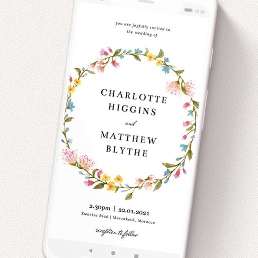 A digital wedding invite named 'Spring Wreath'. It is a smartphone screen sized invite in a portrait orientation. 'Spring Wreath' is available as a flat invite, with mainly pink colouring.