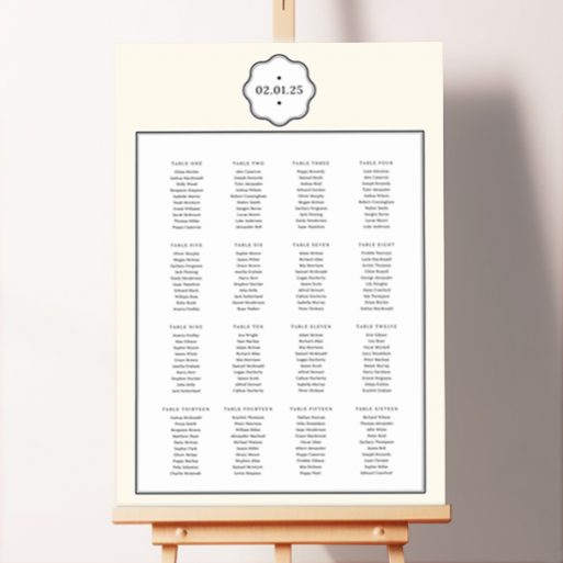 Refined Elegant Engraving Seating Plan featuring a crest with the wedding date at the top, the couple's names in a white box below, all on a cream background with a double black border, exuding timeless elegance.. This design shows 16 tables.