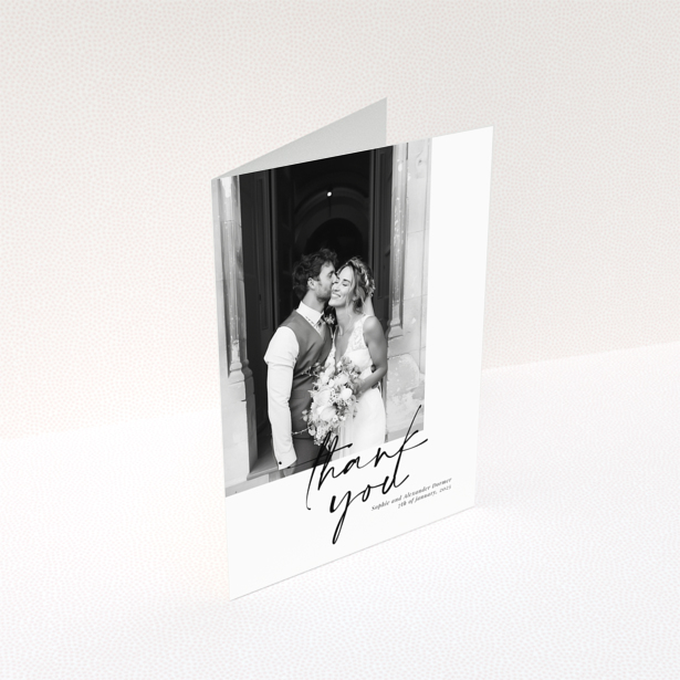 Wedding thank you card design featuring one photo of a bride and groom.