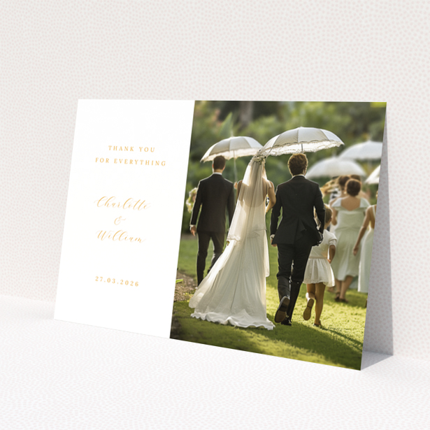 Wedding thank you card design featuring bride and groom with one photo.