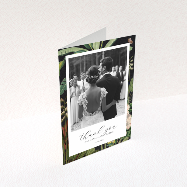 Wedding thank you card with one photo featuring a bride and groom, floral border, and elegant script text.