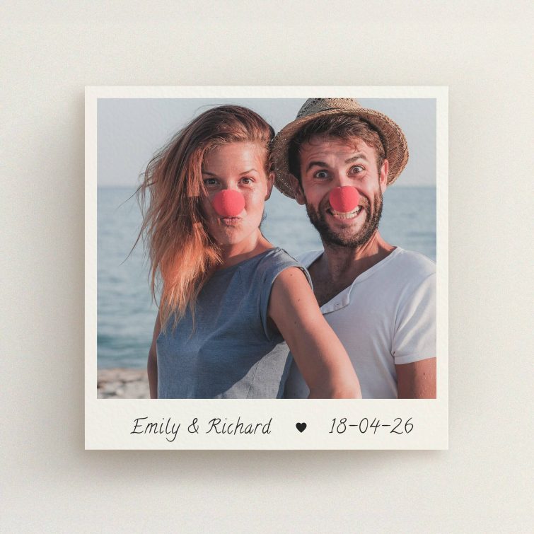 Playful engagement party invitations with a couple wearing red clown noses on a seaside background, 1 photo