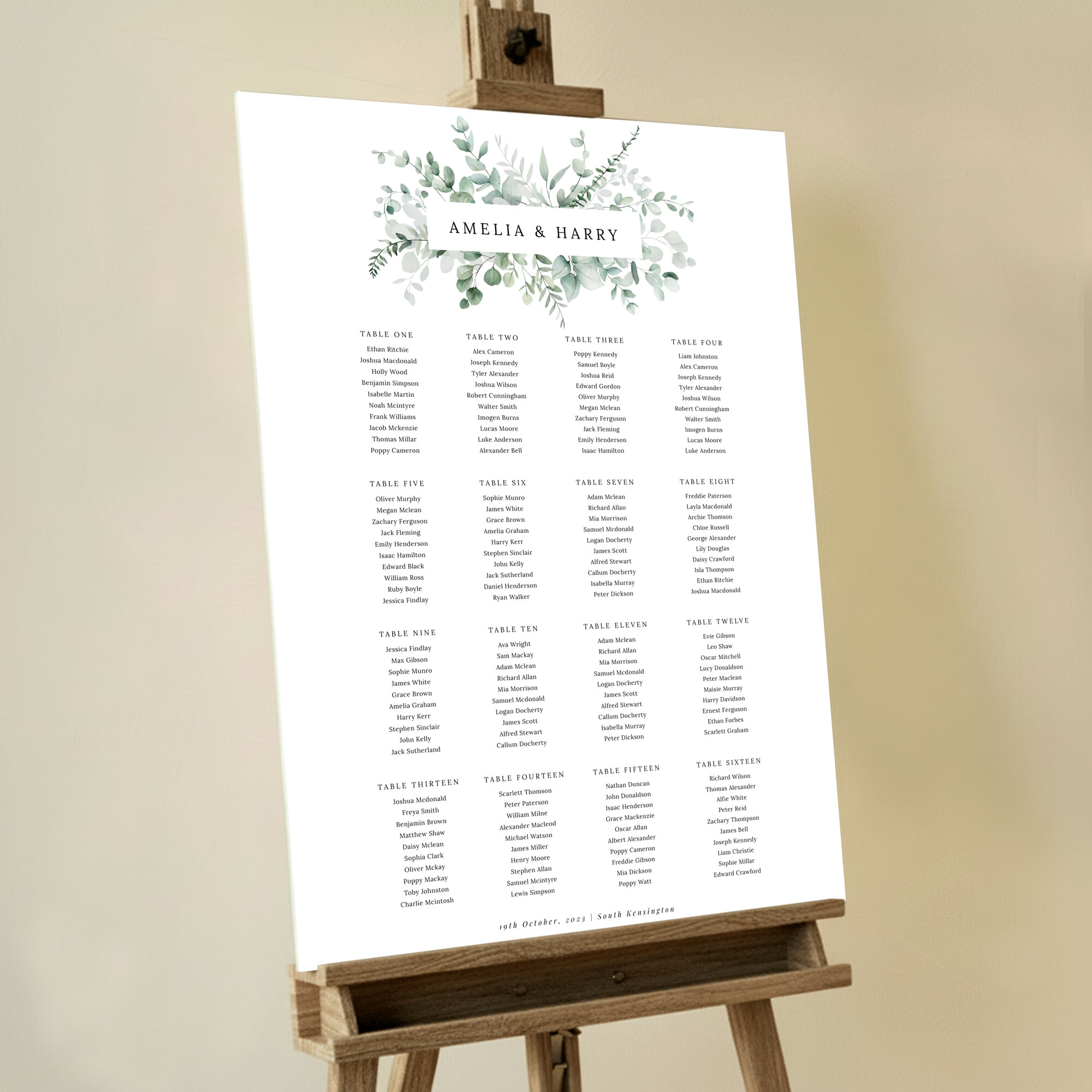 Personalized Eucalyptus Bloom Foamex Wedding Seating Plan displayed on a wooden easel. This design shows 16 tables.