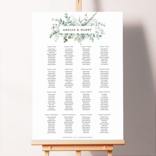 Personalized Eucalyptus Bloom Foamex Wedding Seating Plan displayed on a wooden easel. This design shows 16 tables.