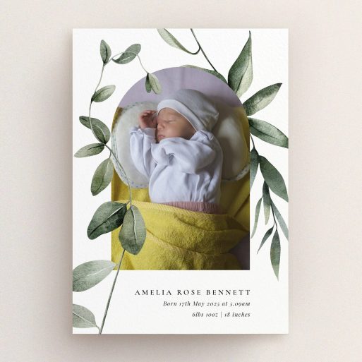 Elegant birth announcement card design featuring one photo with botanical accents and personalised text.