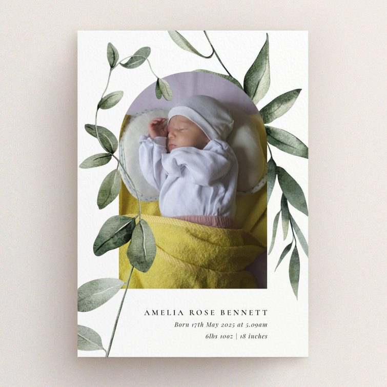 Elegant birth announcement card design featuring one photo with botanical accents and personalised text.