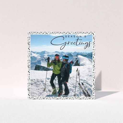 A family christmas card called "Alpine Christmas". It is a square (148mm x 148mm) card in a square orientation. It is a photographic family christmas card with room for 1 photo. "Alpine Christmas" is available as a folded card, with tones of black and white.
