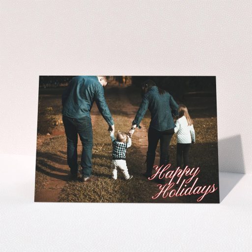 A family christmas card design titled "Happy Holidays". It is an A5 card in a landscape orientation. It is a photographic family christmas card with room for 1 photo. "Happy Holidays" is available as a folded card.