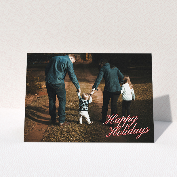 A family christmas card design titled "Happy Holidays". It is an A5 card in a landscape orientation. It is a photographic family christmas card with room for 1 photo. "Happy Holidays" is available as a folded card.