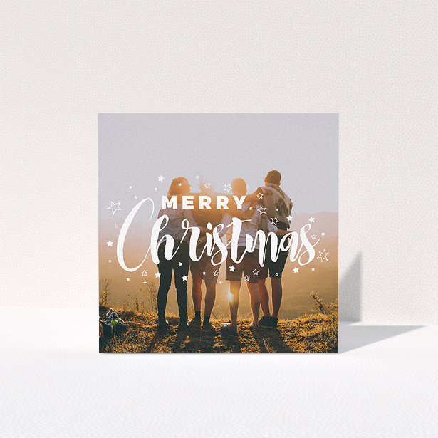 A family christmas card design named "Jolly Old Christmas". It is a square (148mm x 148mm) card in a square orientation. It is a photographic family christmas card with room for 1 photo. "Jolly Old Christmas" is available as a folded card, with mainly white colouring.