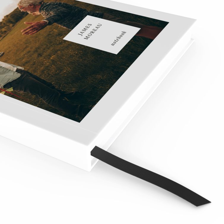 Portrait notebook design featuring a single photograph on the cover.