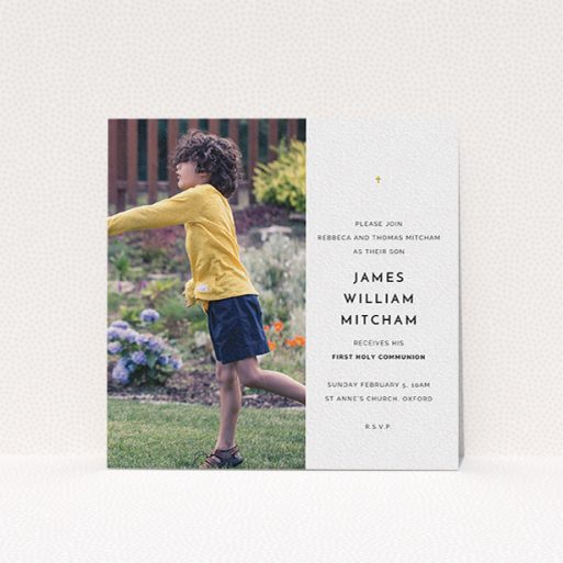 A first holy communion invitation design named "Tiny Cross". It is a square (148mm x 148mm) invite in a square orientation. It is a photographic first holy communion invitation with room for 1 photo. "Tiny Cross" is available as a flat invite, with tones of white and gold.