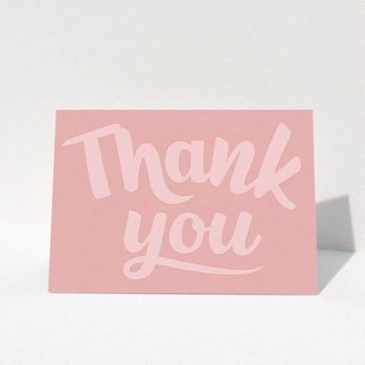A first holy communion thank you card design titled "Big Pink Typography". It is an A6 card in a landscape orientation. "Big Pink Typography" is available as a folded card, with mainly pink colouring.