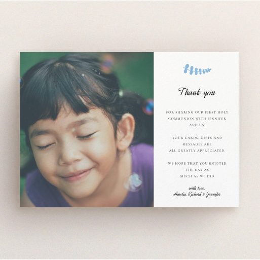 First Holy Communion Thank You Card Design - "Blue Fern" A first holy communion thank you card called "Blue Fern". It is an A5 card in a landscape orientation. It is a photographic first holy communion thank you card with room for 1 photo. "Blue Fern" is available as a flat card, with tones of white and blue.