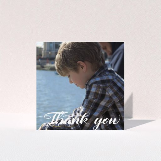 First Holy Communion Thank You Card Design - "Handwritten Italic" A first holy communion thank you card design named "Handwritten Italic". It is a square (148mm x 148mm) card in a square orientation. It is a photographic first holy communion thank you card with room for 1 photo. "Handwritten Italic" is available as a folded card, with mainly white colouring.