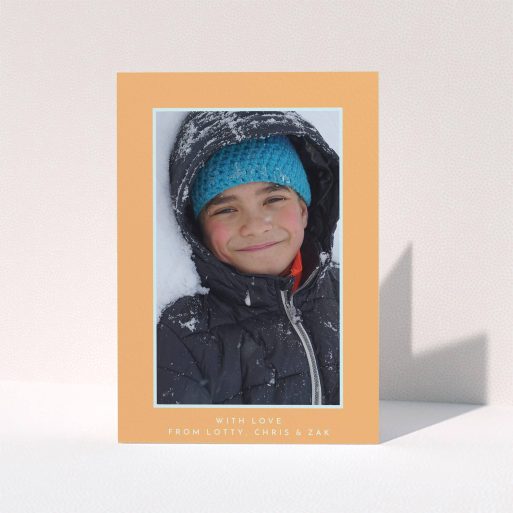First Holy Communion Thank You Card Design - "Orange and Mint" A first holy communion thank you card named "Orange and Mint". It is an A6 card in a portrait orientation. It is a photographic first holy communion thank you card with room for 1 photo. "Orange and Mint" is available as a folded card, with tones of orange and blue.