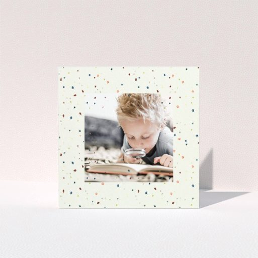 First Holy Communion Thank You Card Design - "Pastel Dots" A first holy communion thank you card design titled "Pastel Dots". It is a square (148mm x 148mm) card in a square orientation. It is a photographic first holy communion thank you card with room for 1 photo. "Pastel Dots" is available as a folded card, with mainly cream colouring.