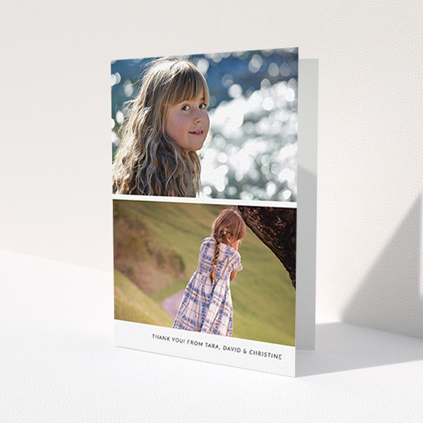 A first holy communion thank you card called 'Stacked Landscapes'. It is an A6 card in a portrait orientation. It is a photographic first holy communion thank you card with room for 2 photos. 'Stacked Landscapes' is available as a folded card, with mainly white colouring.
