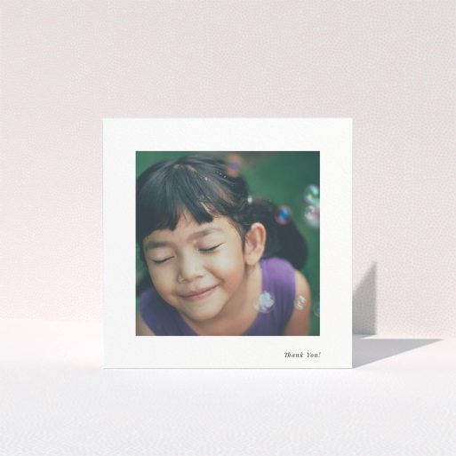 First Holy Communion Thank You Card Design - "Thank You!" A first holy communion thank you card named "Thank You!". It is a square (148mm x 148mm) card in a square orientation. It is a photographic first holy communion thank you card with room for 1 photo. "Thank You!" is available as a folded card, with mainly white colouring.