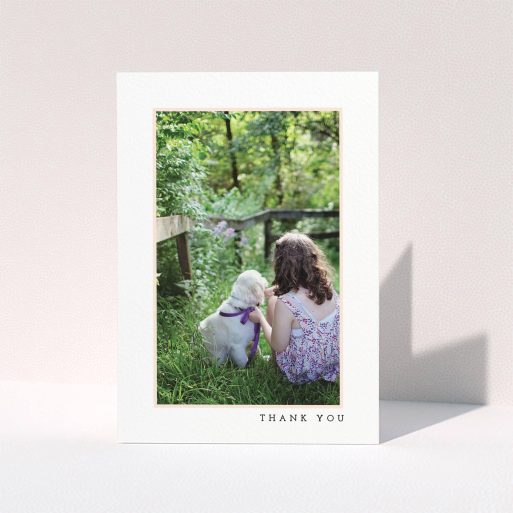 First Holy Communion Thank You Card Design - "Thin Pink Frame" A first holy communion thank you card design titled "Thin Pink Frame". It is an A6 card in a portrait orientation. It is a photographic first holy communion thank you card with room for 1 photo. "Thin Pink Frame" is available as a folded card, with tones of white and pink.