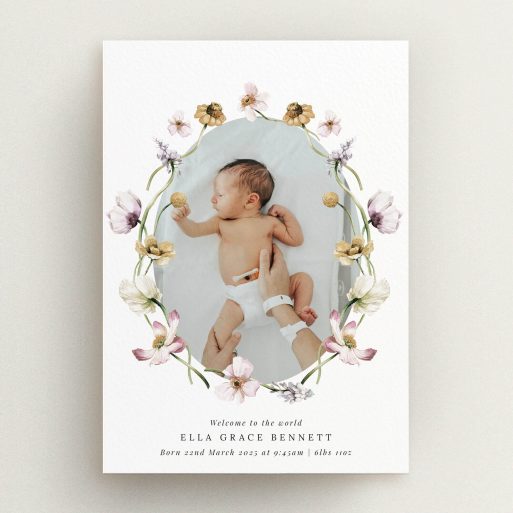 Floral-themed birth announcement card with one baby photo.
