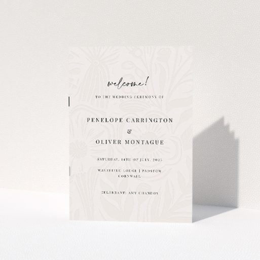Floral Behind Wedding Order of Service booklet with gentle emboss-style floral pattern in muted grey, complementing crisp black typography This is a view of the front