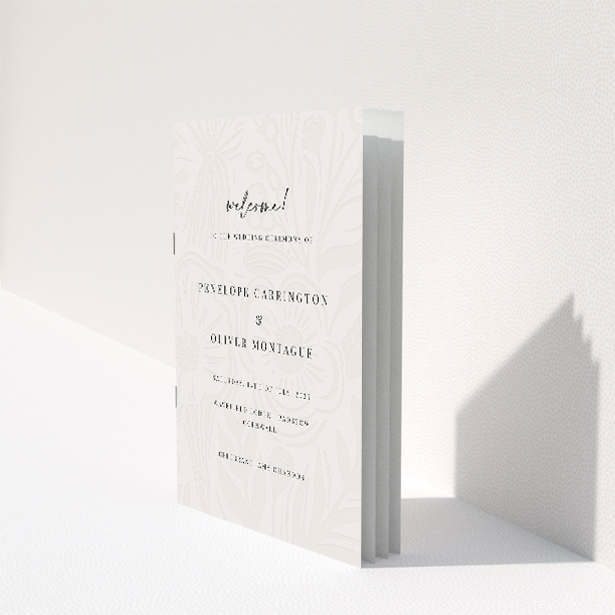 Floral Behind Wedding Order of Service booklet with gentle emboss-style floral pattern in muted grey, complementing crisp black typography This image shows the front and back sides together