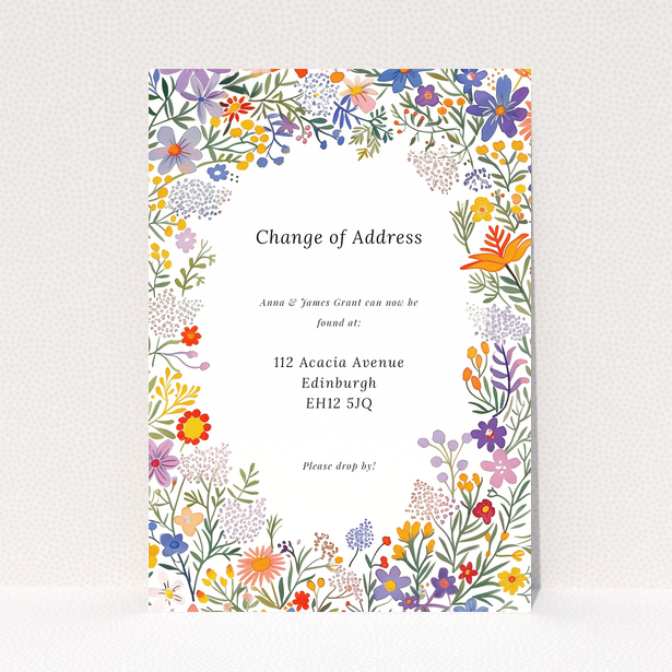 Floral change of address card with two photos and vibrant flower border