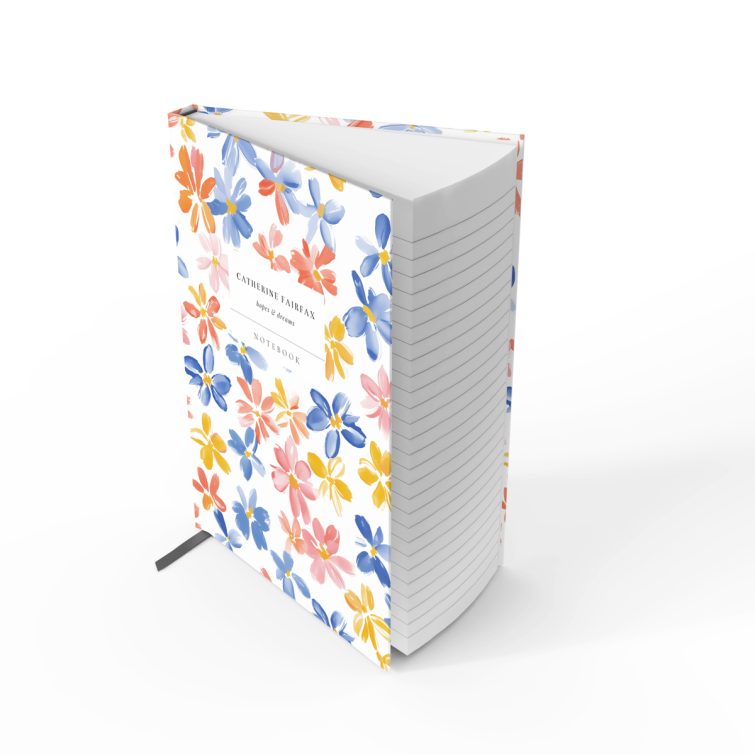 Colourful floral design on a personalised notebook cover spread from Utterly Printable with two photos.