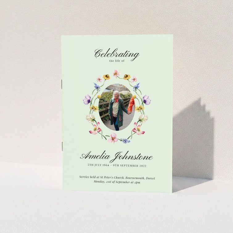 Funeral order of service program design with one photo surrounded by floral decorations