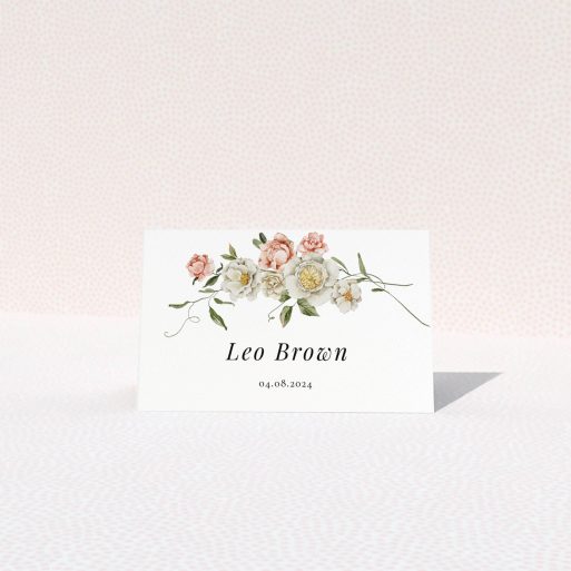 Floral wedding table place card with elegant design featuring two photos of flowers.