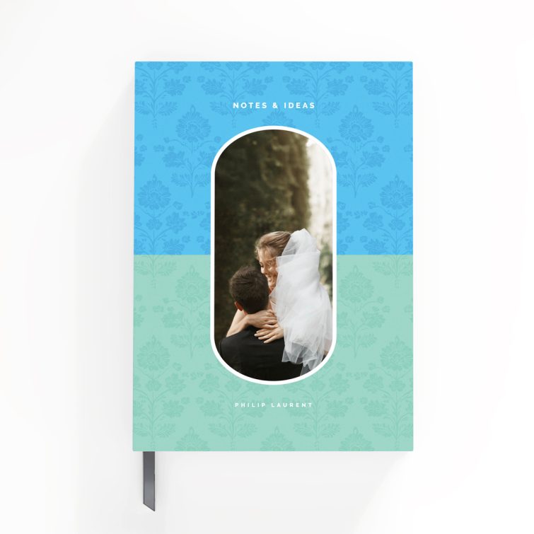 Floral-patterned personalised notebook design with one photo on the cover spread from Utterly Printable.