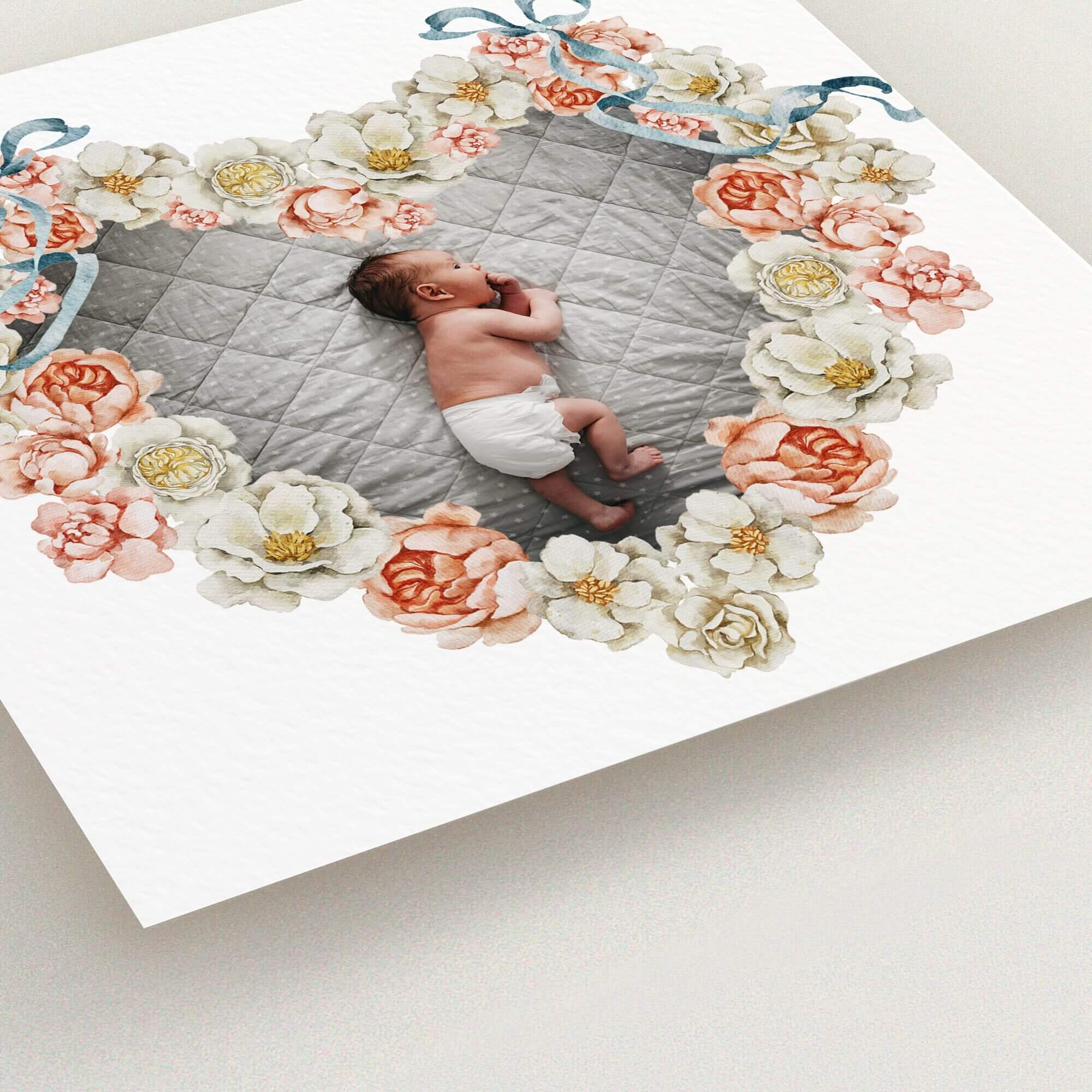 Heart-shaped floral birth announcement card design with one photo of a baby in the centre.