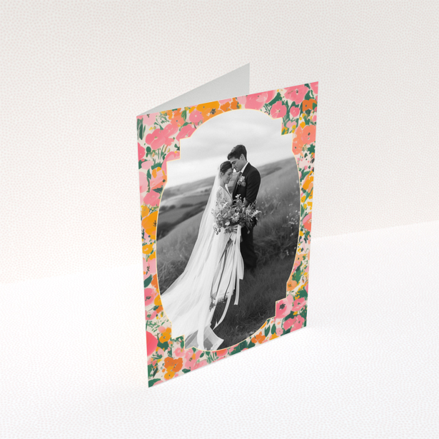 Wedding invitation card with floral border and one photo of a couple