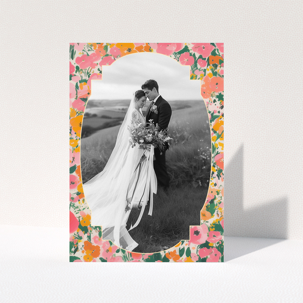 Wedding invitation card with floral border and one photo of a couple